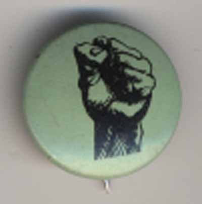raised fist against green background