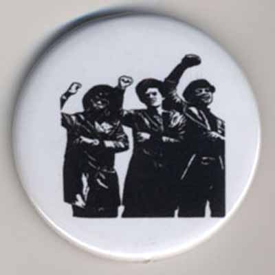 3 men with upraised fists