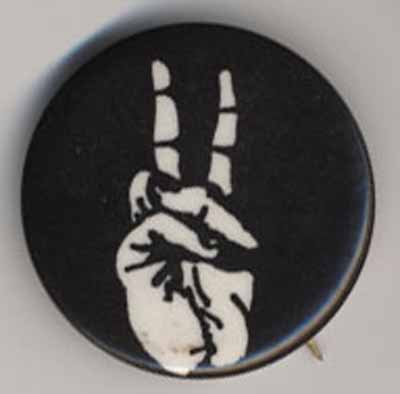 hand forming peace sign black and white