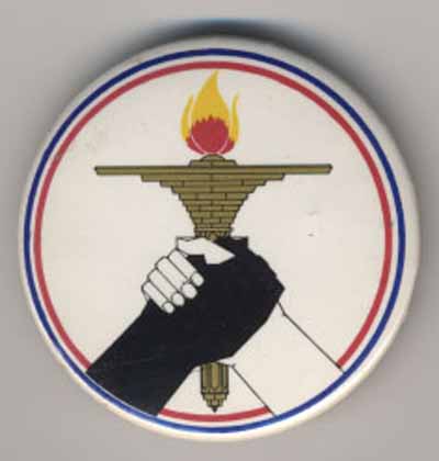 black and white hands grasping flaming torch